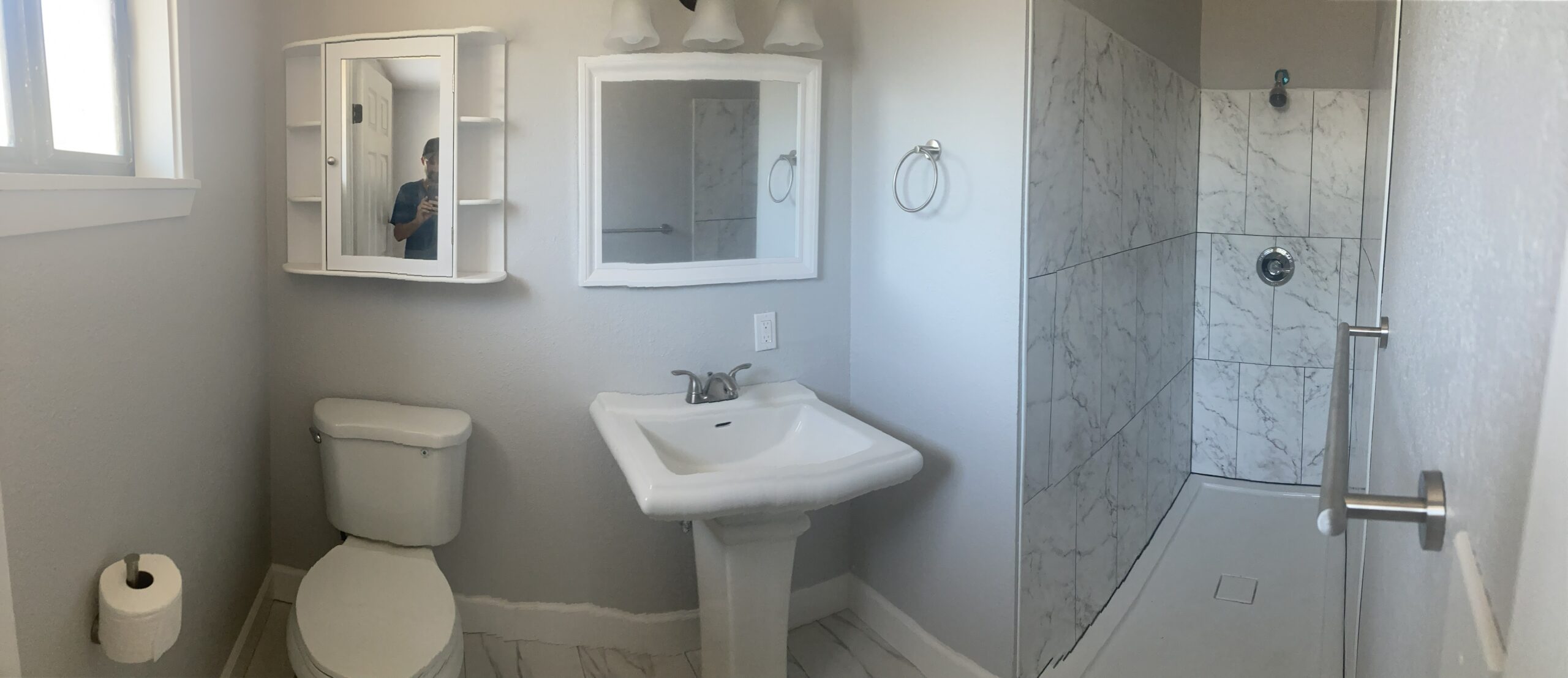 Bathroom remodeling project with updated fixtures and finishes