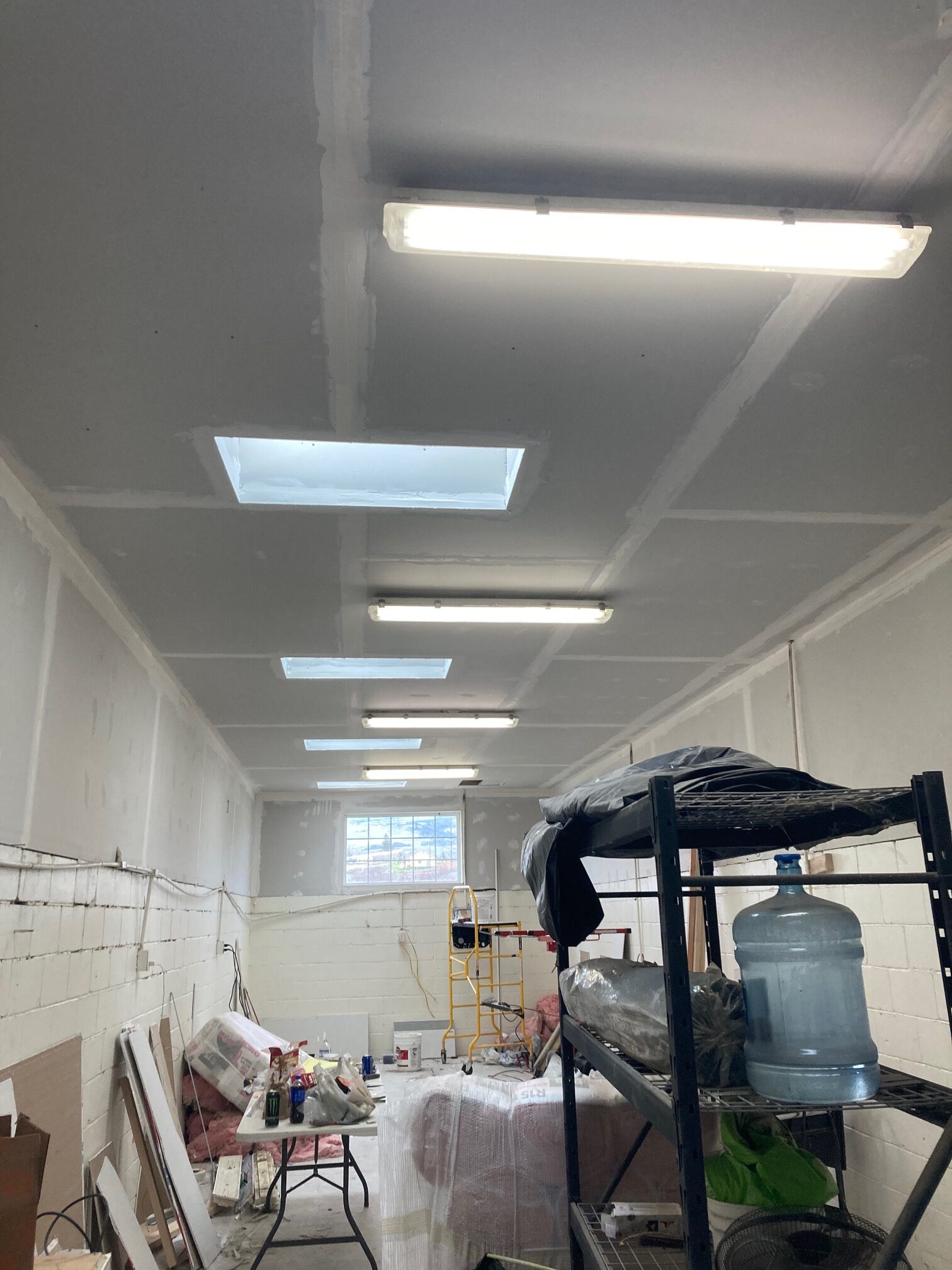 Completed skylight installation and ceiling finish work