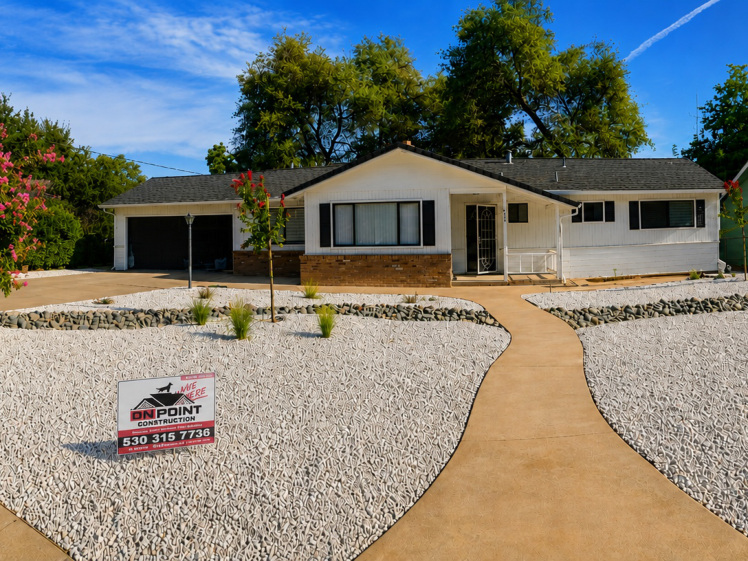 After exterior view of the remodeled single-story home