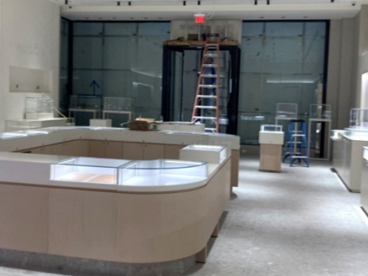 Finished commercial interior buildout with retail fixtures installed