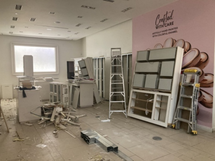 Commercial space during debranding and demolition before buildout