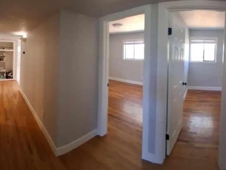 Completed residential interior remodel with refinished wood floors and updated rooms