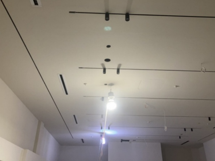 Ceiling lighting installation during retail buildout