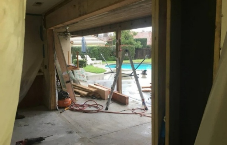 Opening modification in progress for door installation project