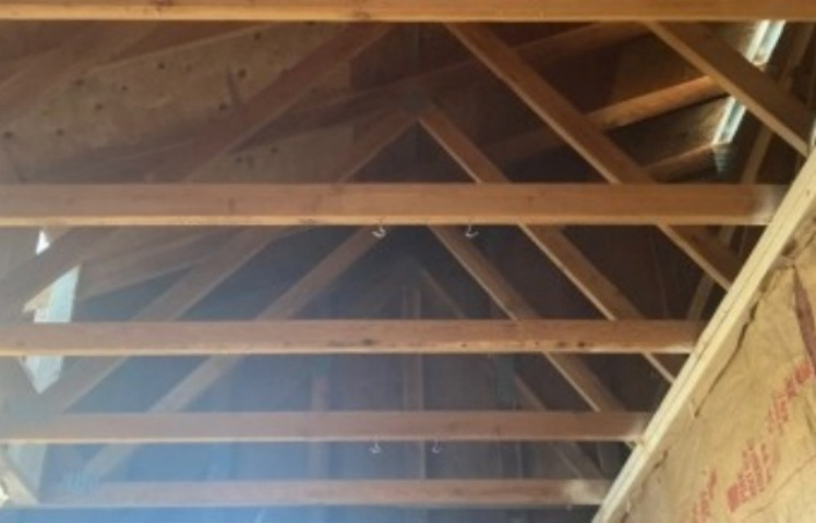 Roof framing opened for new skylight conversion