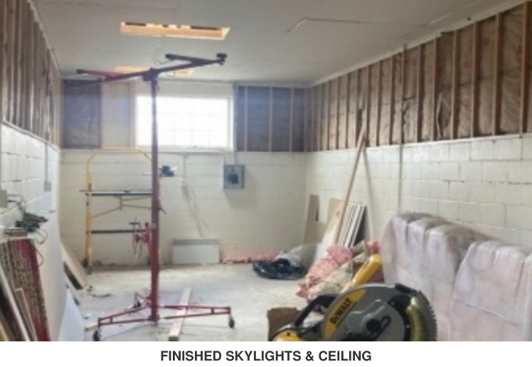 Finished skylights and ceiling during outbuilding conversion