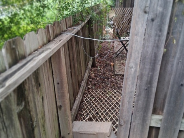 Original fence condition before replacement